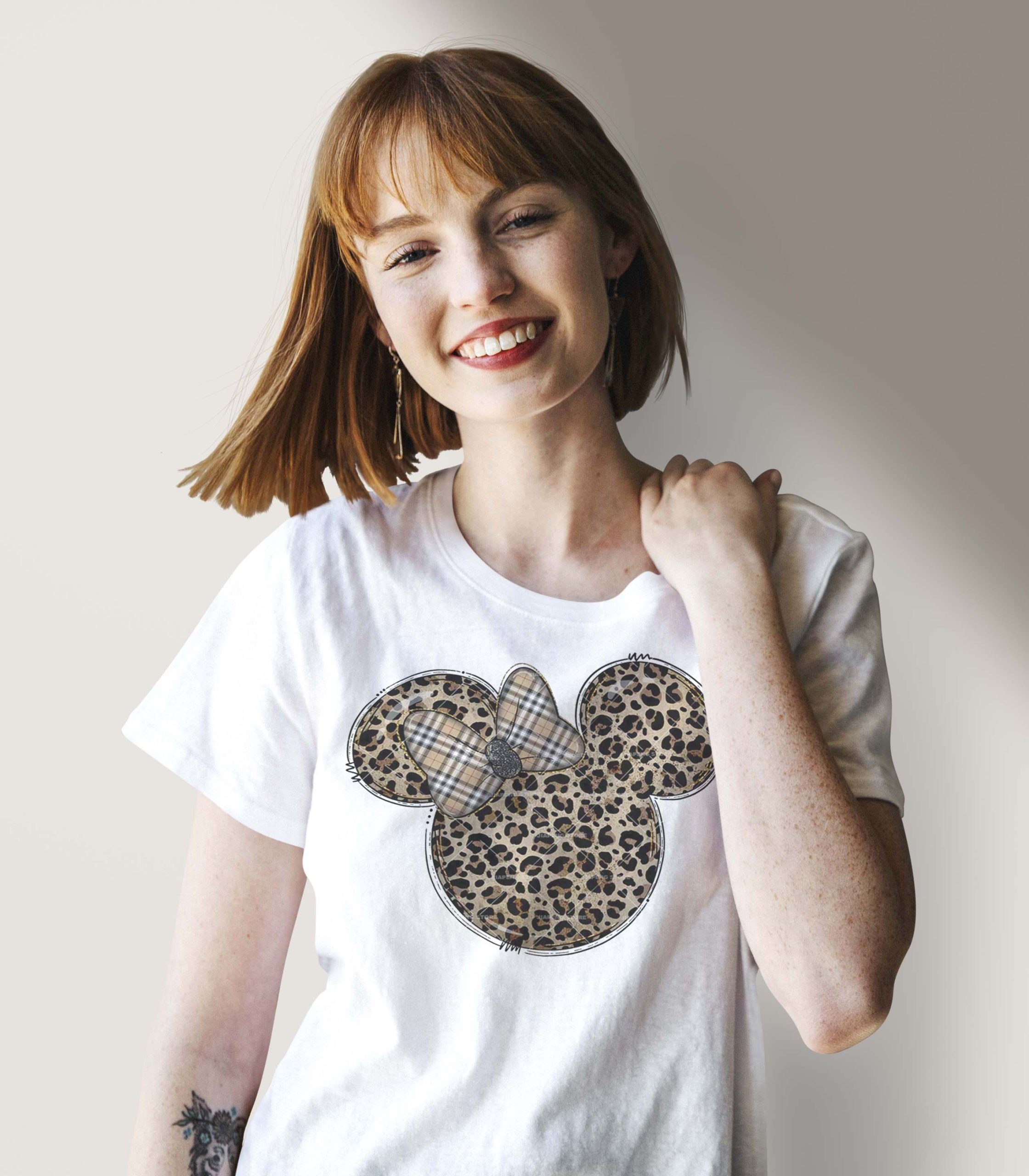 Smiling woman wearing a silk screenwhite t-shirt mockup